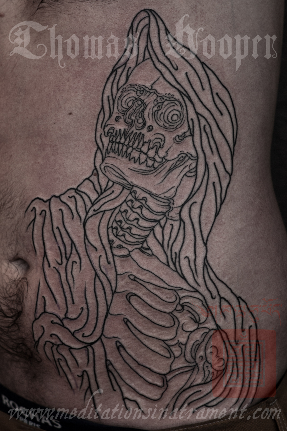 tagged grim reaper tattoo